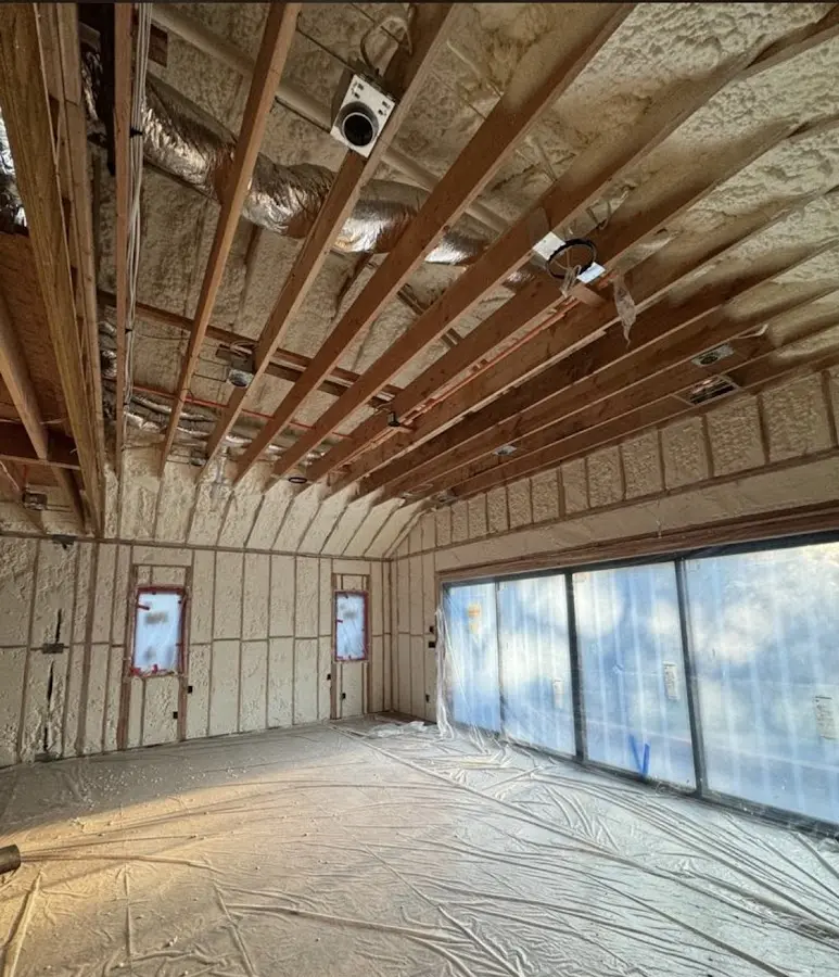 Interior walls and ceiling insulated with spray foam during new construction in Aransas Pass
